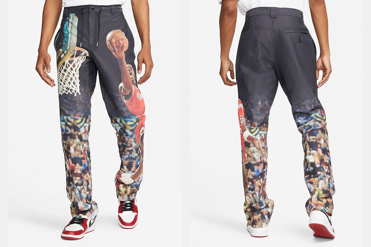 Two model shots of a model in a pair of navy twill graphic Nike Jordan pants with an image on Michael Jordan on a white background