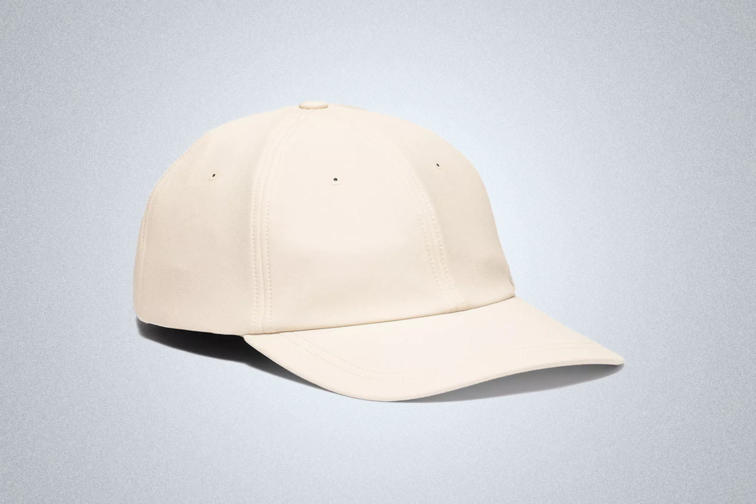 a white cap from lululemon on a grey background