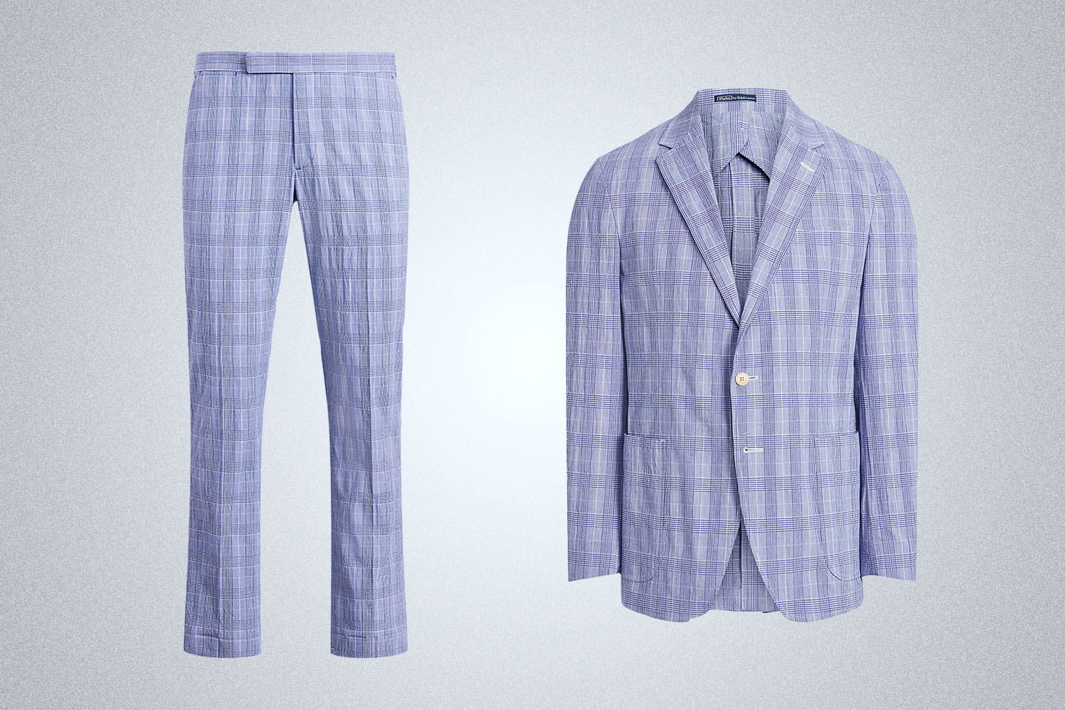 a blue checked seersucker suit from Polo Ralph Lauren on a grey background