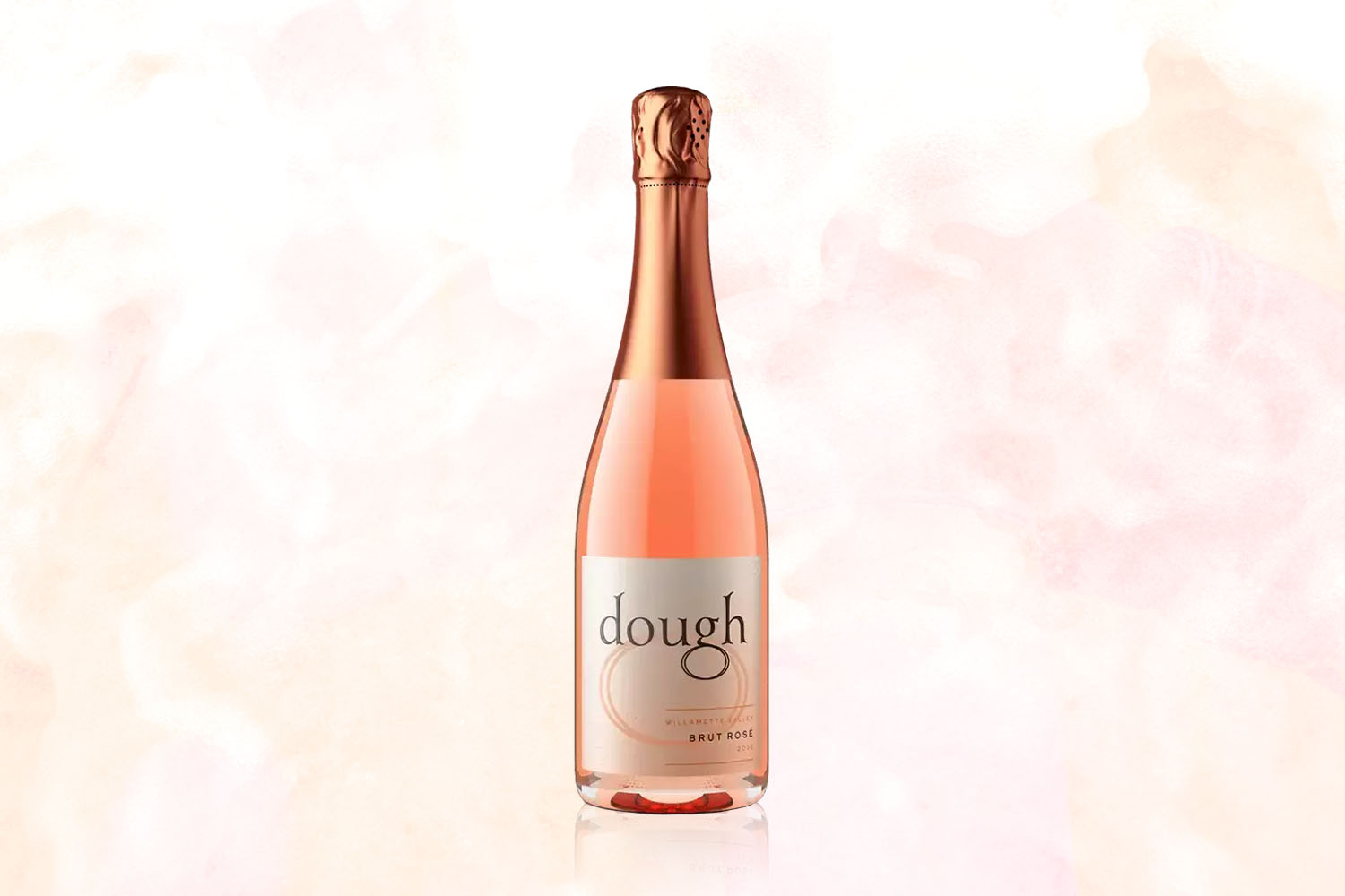 A bottle of Dough Sparkling Rosé on a pale pink background