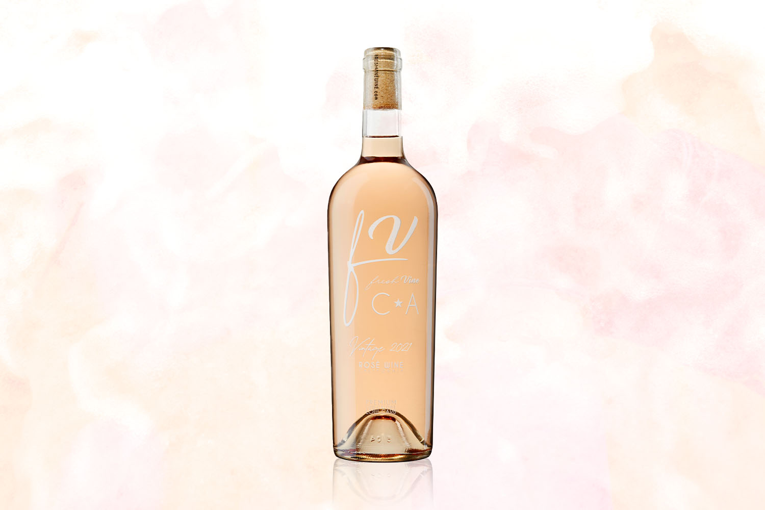 A bottle of Fresh Vine Wines rosé on a pale pink background