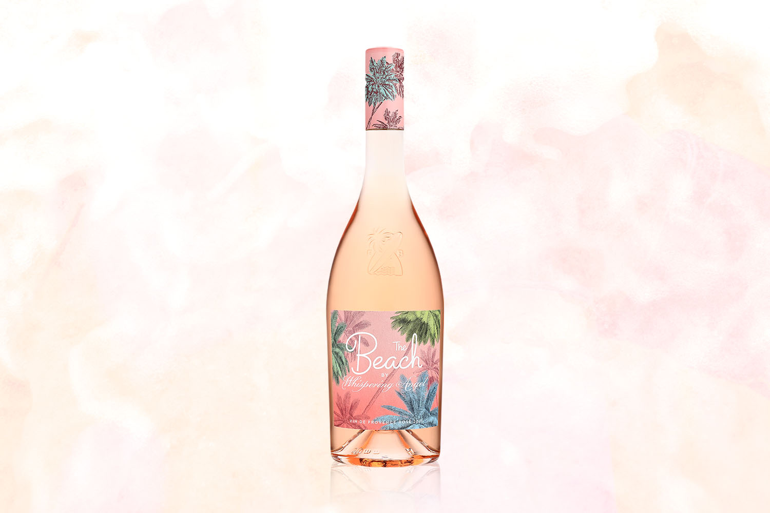 A bottle of The Beach By Whispering Angel on a pale pink background