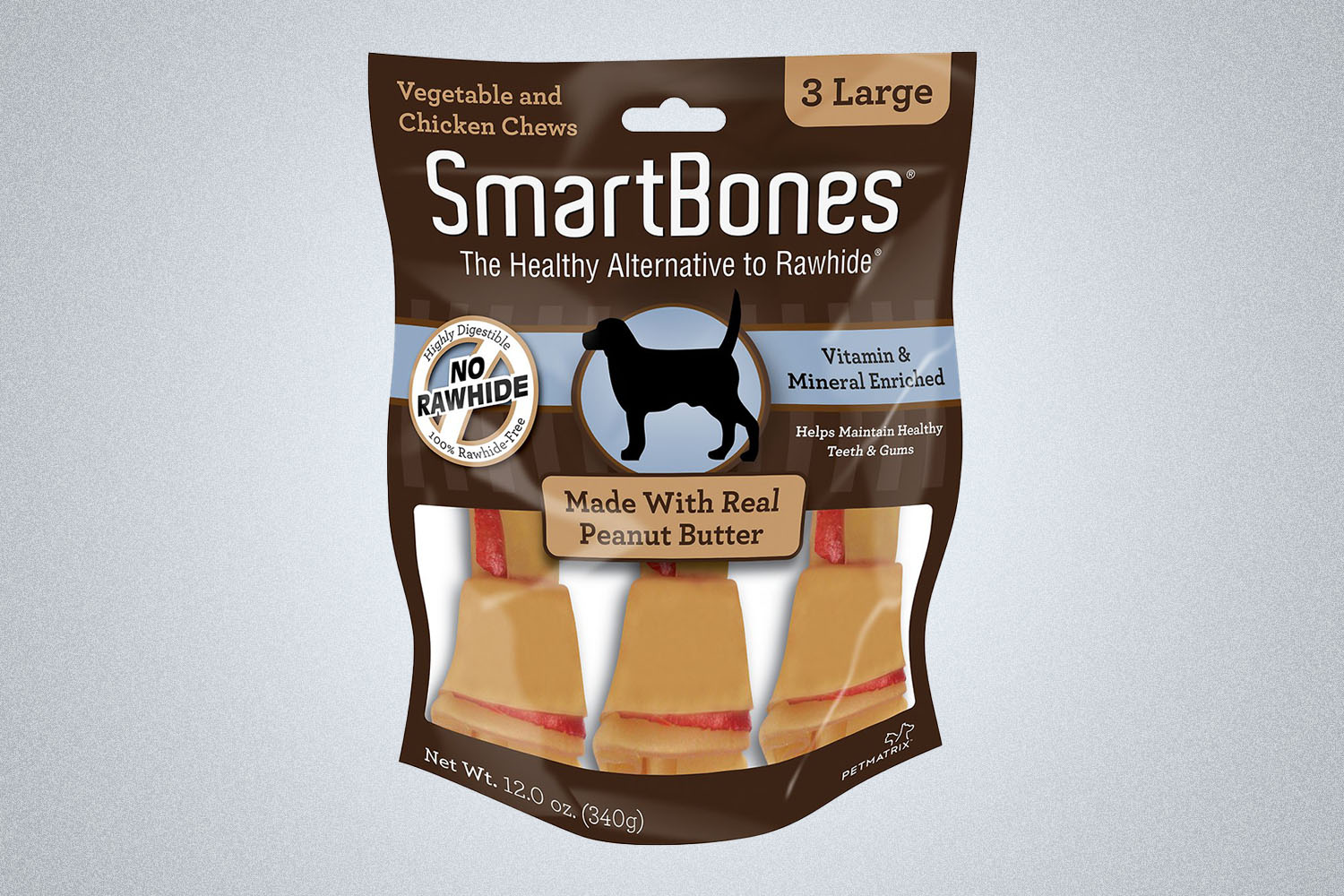 a package of SmartBones peanut butter dog bones on a grey background