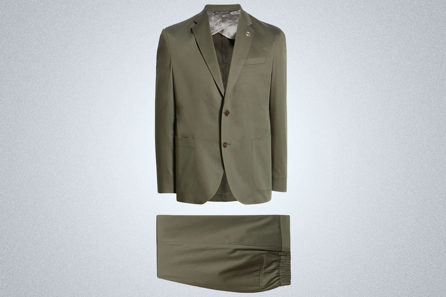 a green cotton suit from Ted Baker London on a grey background