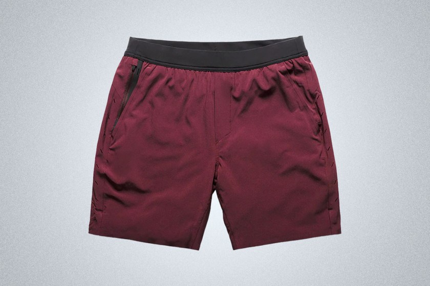 A pair of maroon Ten Thousand Interval Shorts on a grey background
