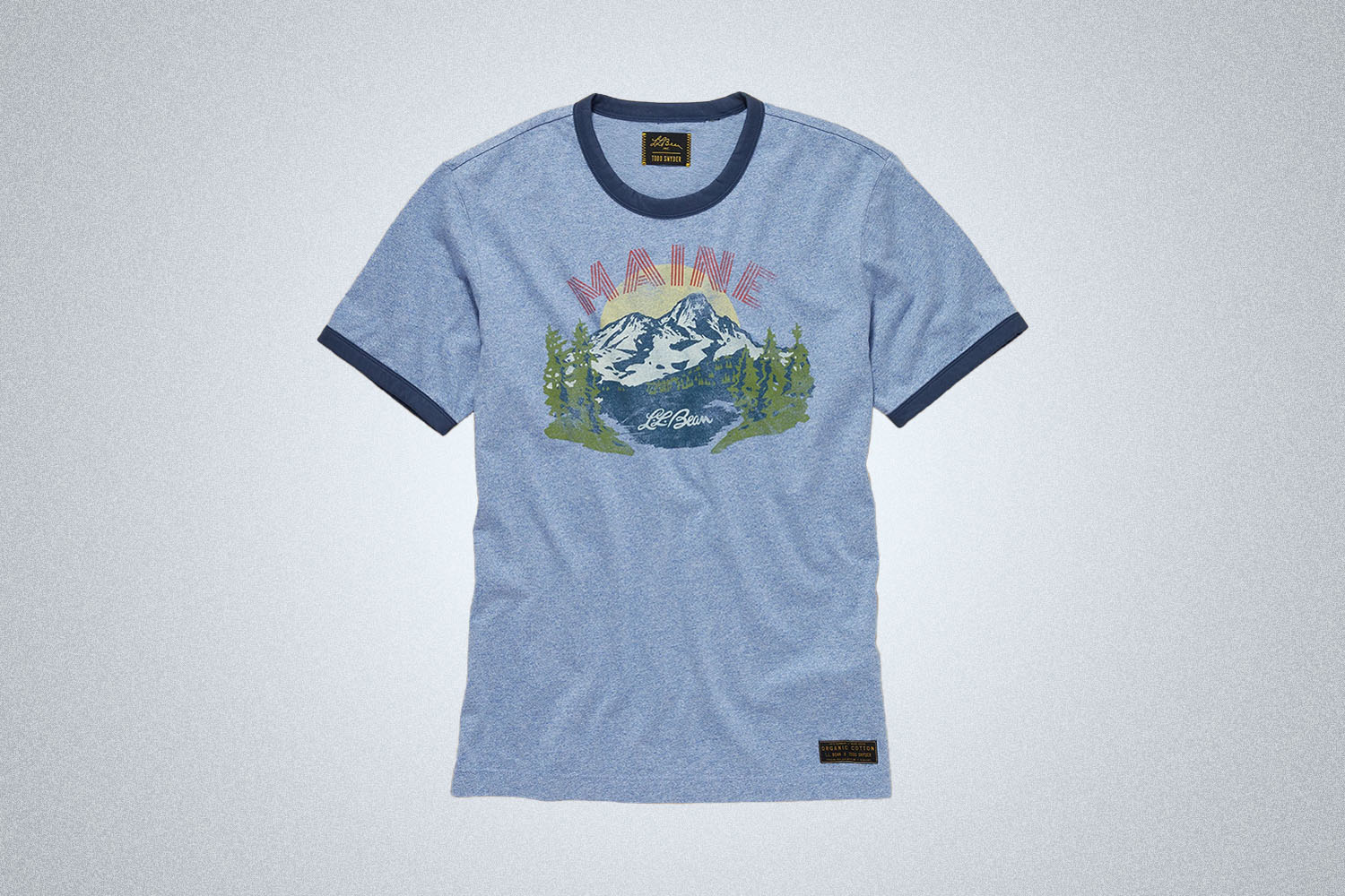 a blue ringer tee from Todd Snyder on a grey background