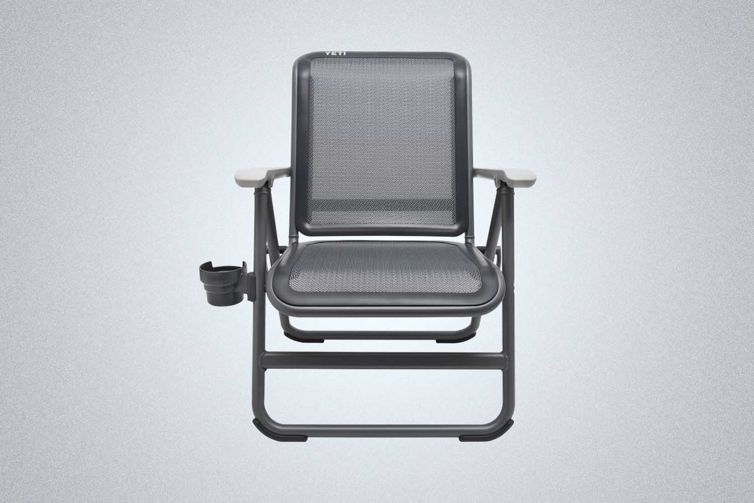 a silver outdoors chair from YETI on a grey background