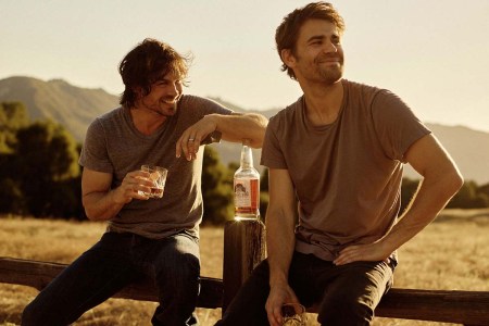 Actors turned whiskey blenders Ian Somerhalder and Paul Wesley with a bottle of their Brother's Bond bourbon