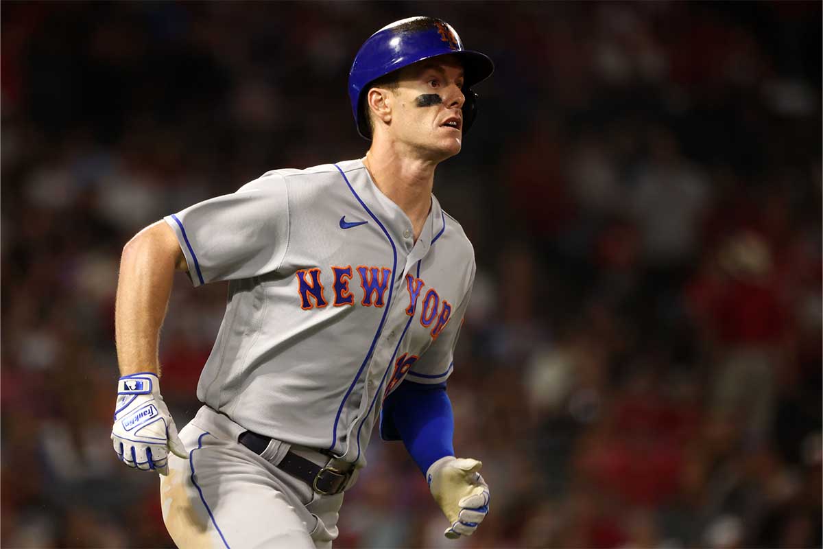 Mark Canha #19 of the New York Mets runs to first on an RBI single in the seventh during the game between the New York Mets and the Los Angeles Angels at Angel Stadium on Saturday, June 11, 2022 in Anaheim, California.