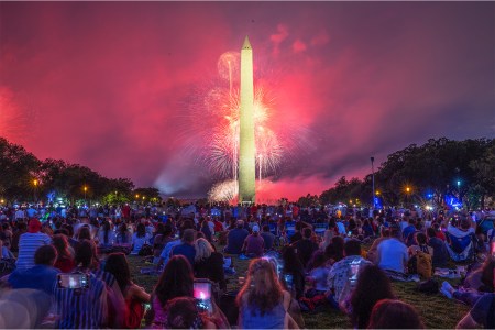 WASHINGTON, DC - JULY 04: Revelers watch the fireworks display on the National Mall in Washington, DC, on Independence Day, July 04, 2021.
