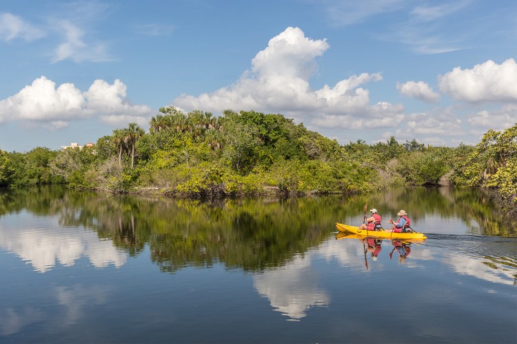 Two people kayaking in Lovers Key State Park near Bonita Springs, Florida