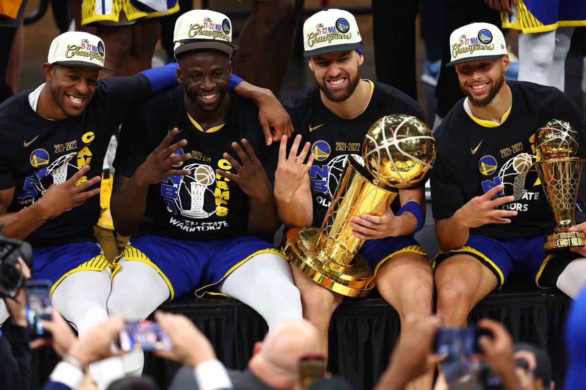 Andre Iguodala, Draymond Green, Klay Thompson and Stephen Curry of the Golden State Warriors pose for a photo.
