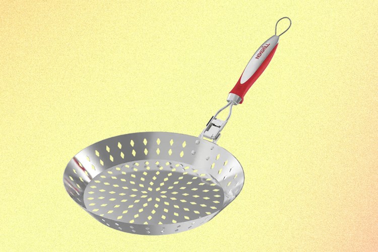 The One Grilling Tool You're Missing Is a Skillet With Holes