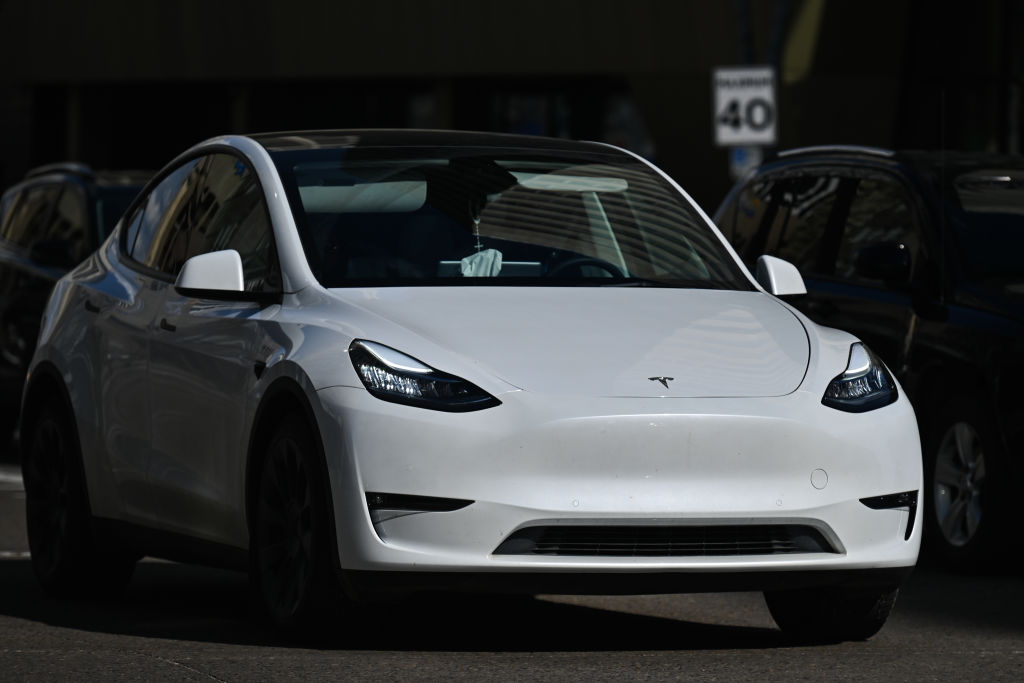 A white Tesla in Edmonton. The NHTSA has said there are now over 750 complaints about phantom braking in Teslas in the US.
