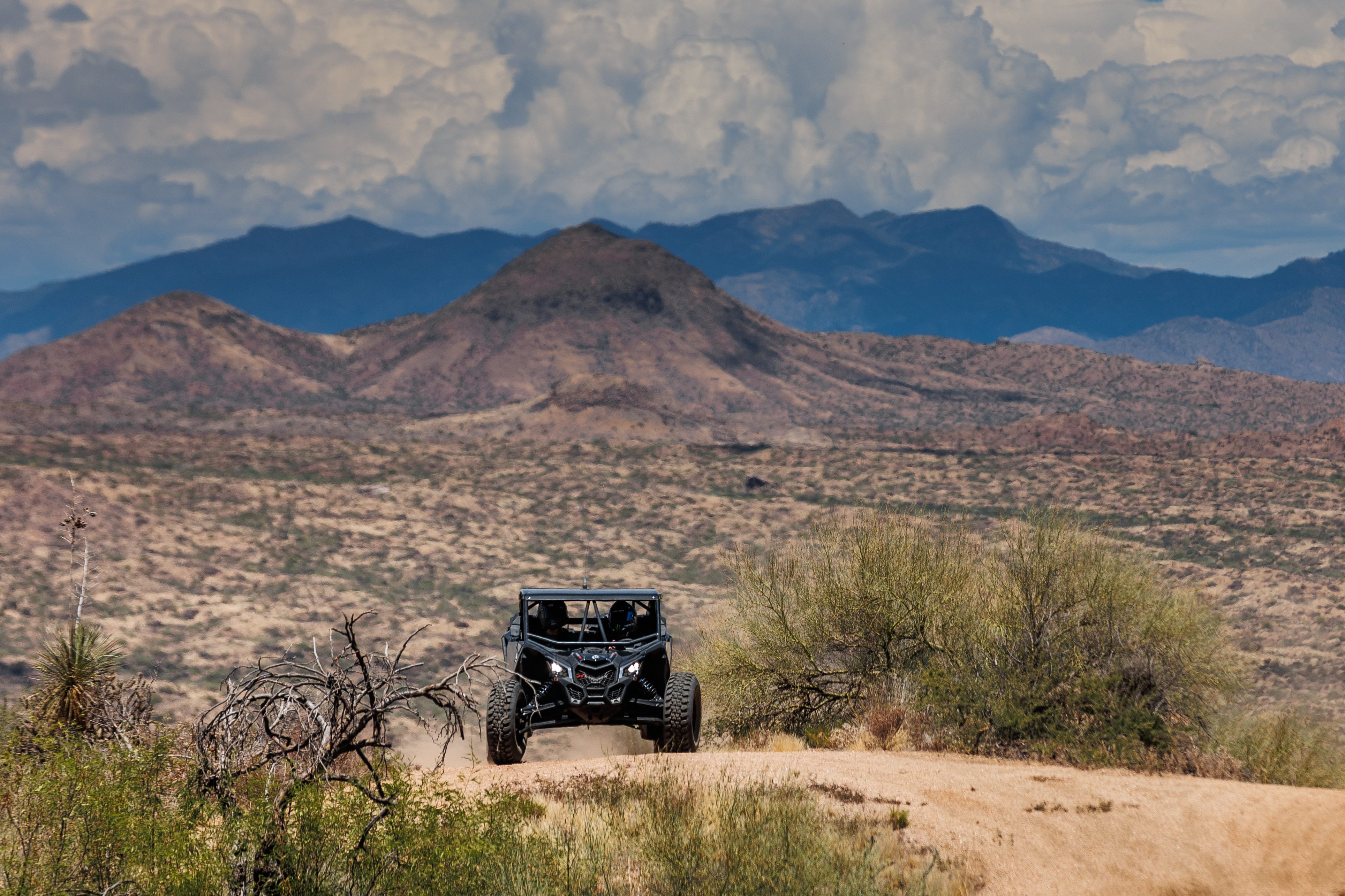 AJ Jones driving in the Arizona desert.