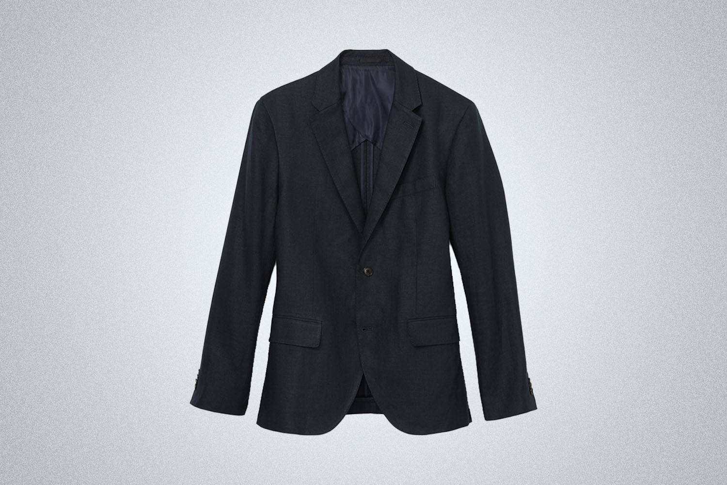 a blue linen blazer from Club Monaco on a grey background