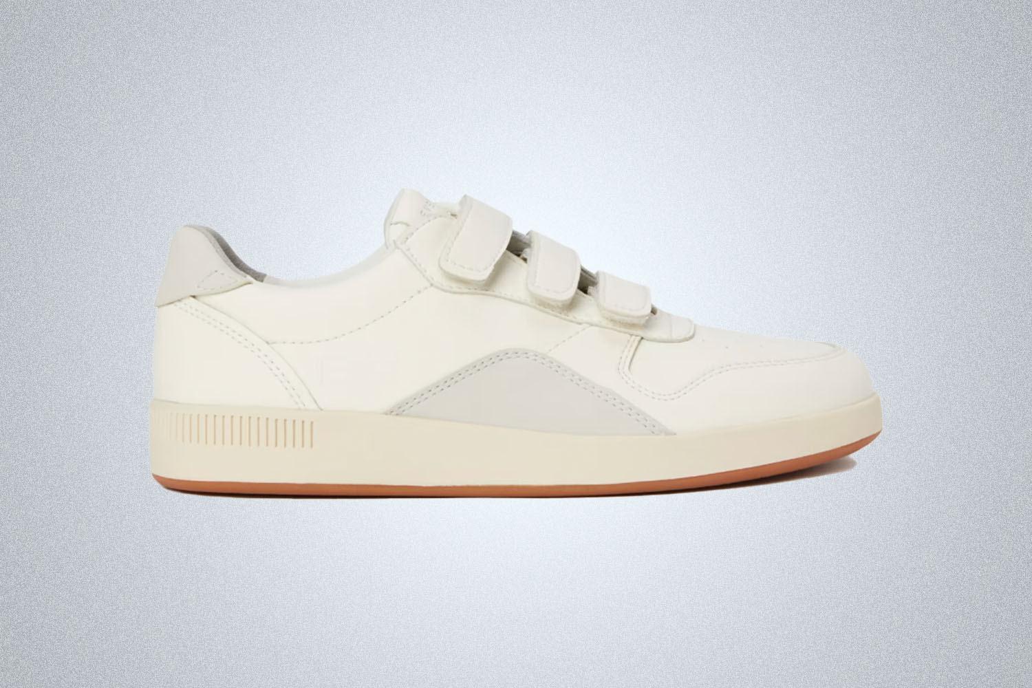 a ReNew white leather court velco sneaker from Everlane on a grey background