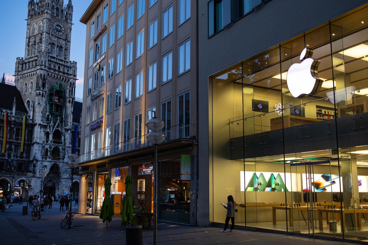 An Apple Inc. store illuminated in the evening in Munich, Germany, on Friday, June 10, 2022. New EU legislation will potentially alter how companies like Apple do business not just in the EU, but perhaps globally.