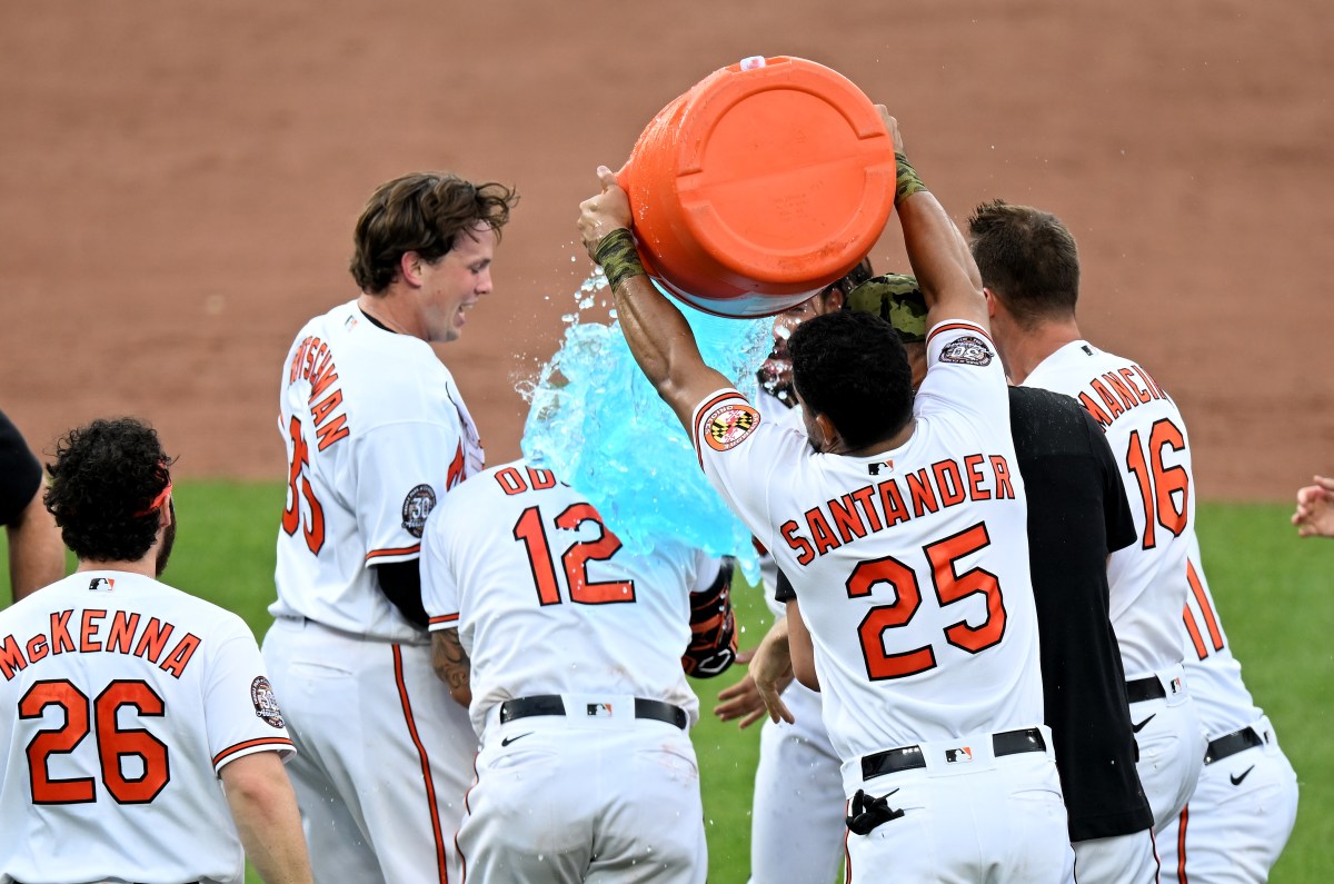 Orioles teammates celebrate with Gatorade after a walk-off win.