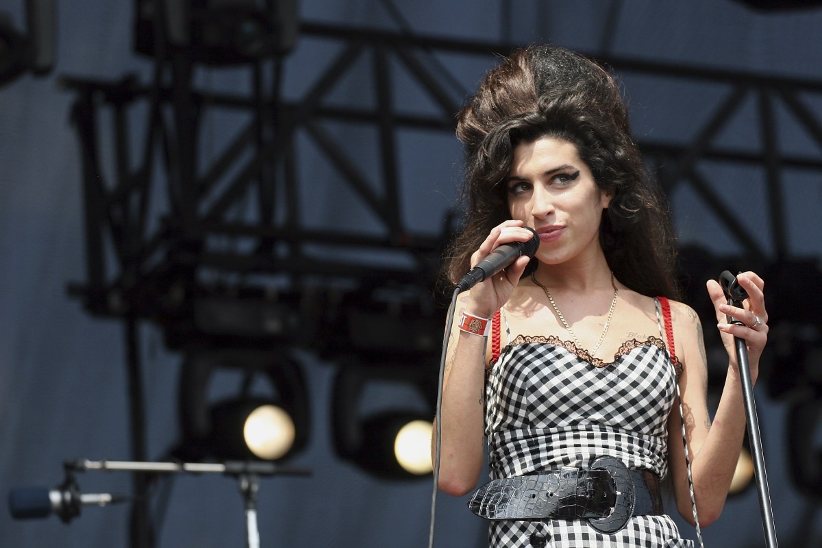 Amy Winehouse performs onstage at Lollapalooza in Grant Park on August 5, 2007 in Chicago, Illinois.
