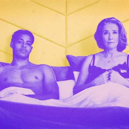 A still from "Good Luck to You Leo Grande" shows stars Emma Thompson (as Nancy Stokes) and Daryl McCormack (as Leo Grande) sitting side by side in bed.