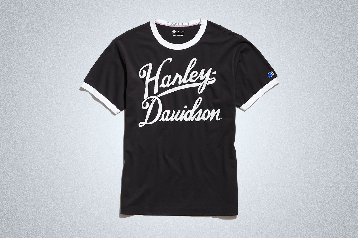 a Harley x Champion ringer tee from Todd Snyder on a grey background