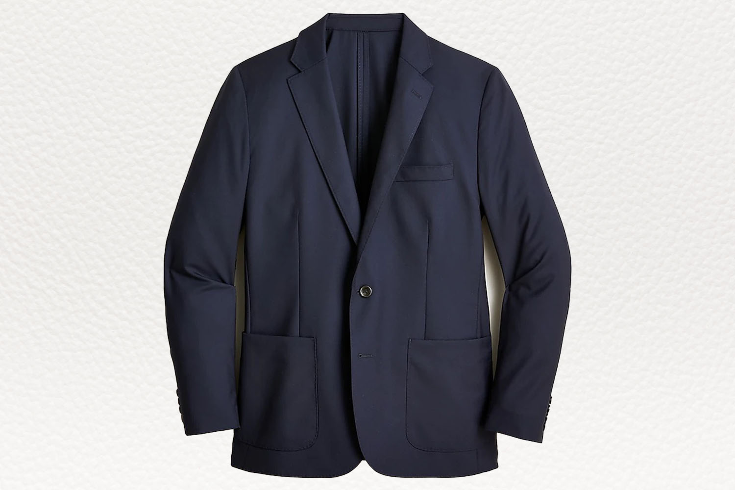 a navy blue blazer from J.Crew on a white textured background