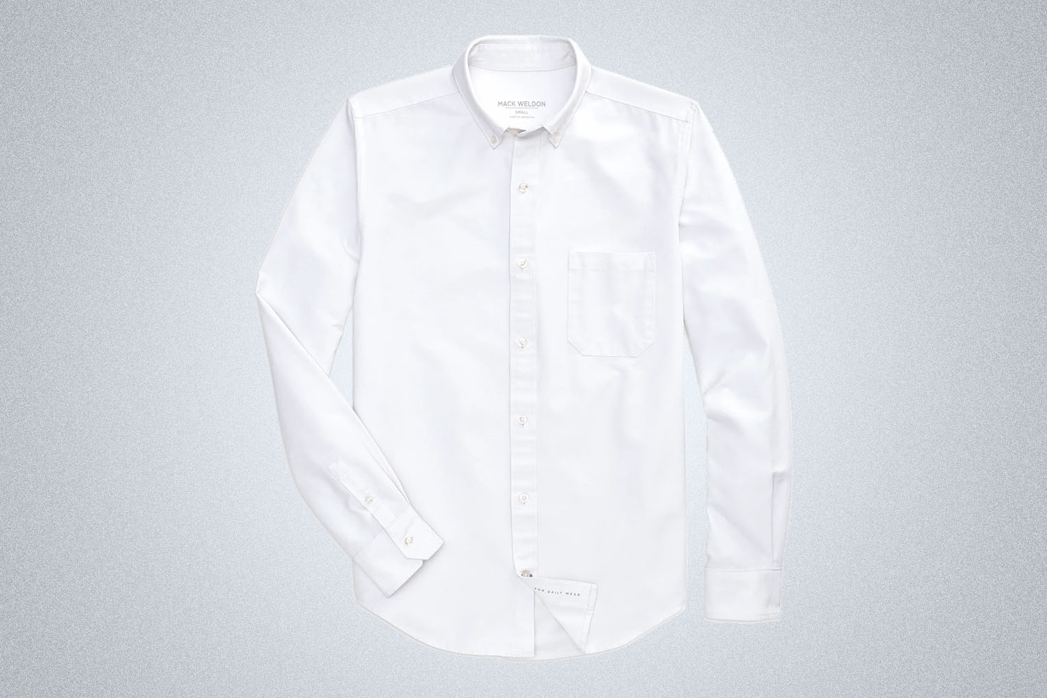a white oxford shirt from Mack Weldon on a grey background