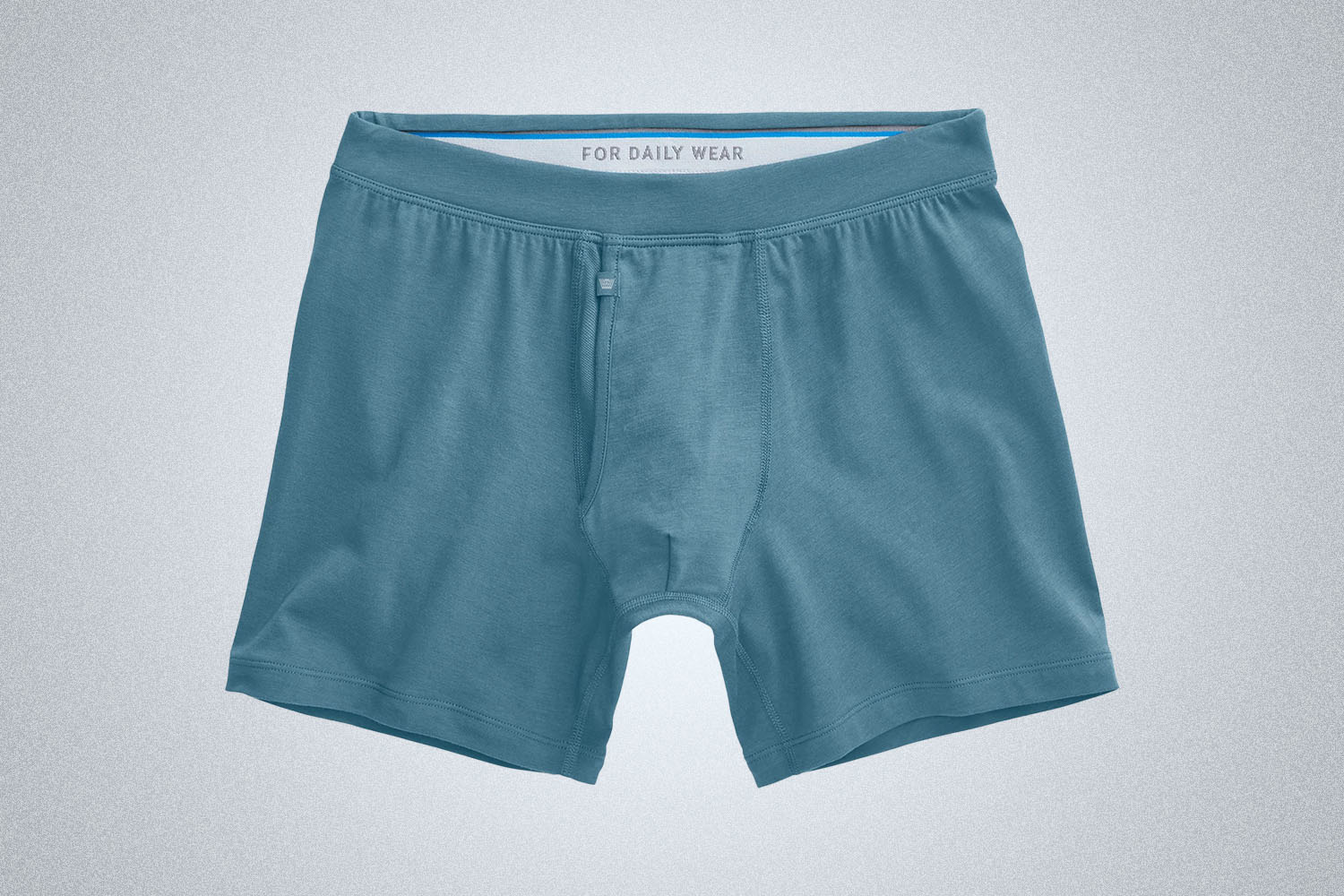 a pair of light blue boxer briefs from Mack Weldon on a grey background