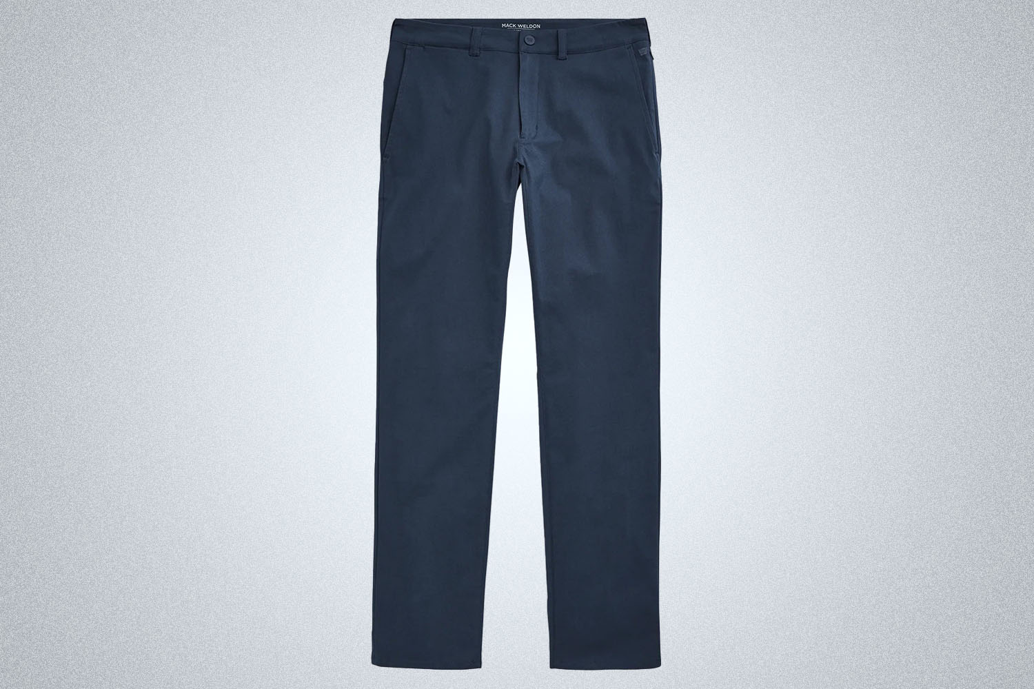 a pair of navy colored chinos from Mack Weldon on a grey background