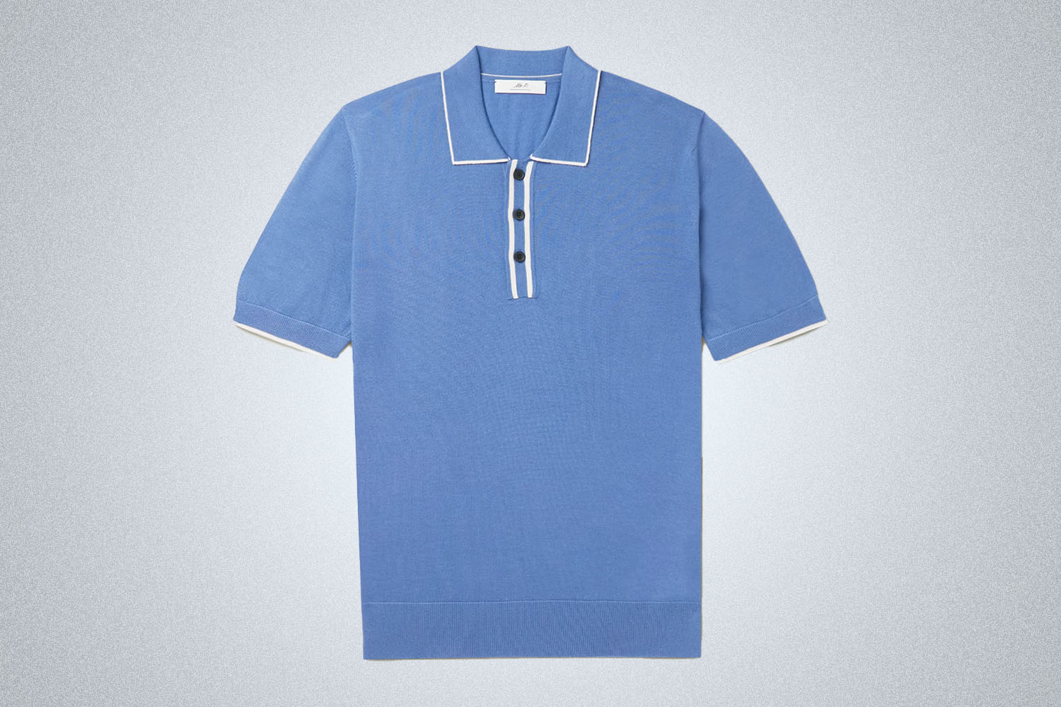 a baby blue cashmere polo from Mr P on a grey background