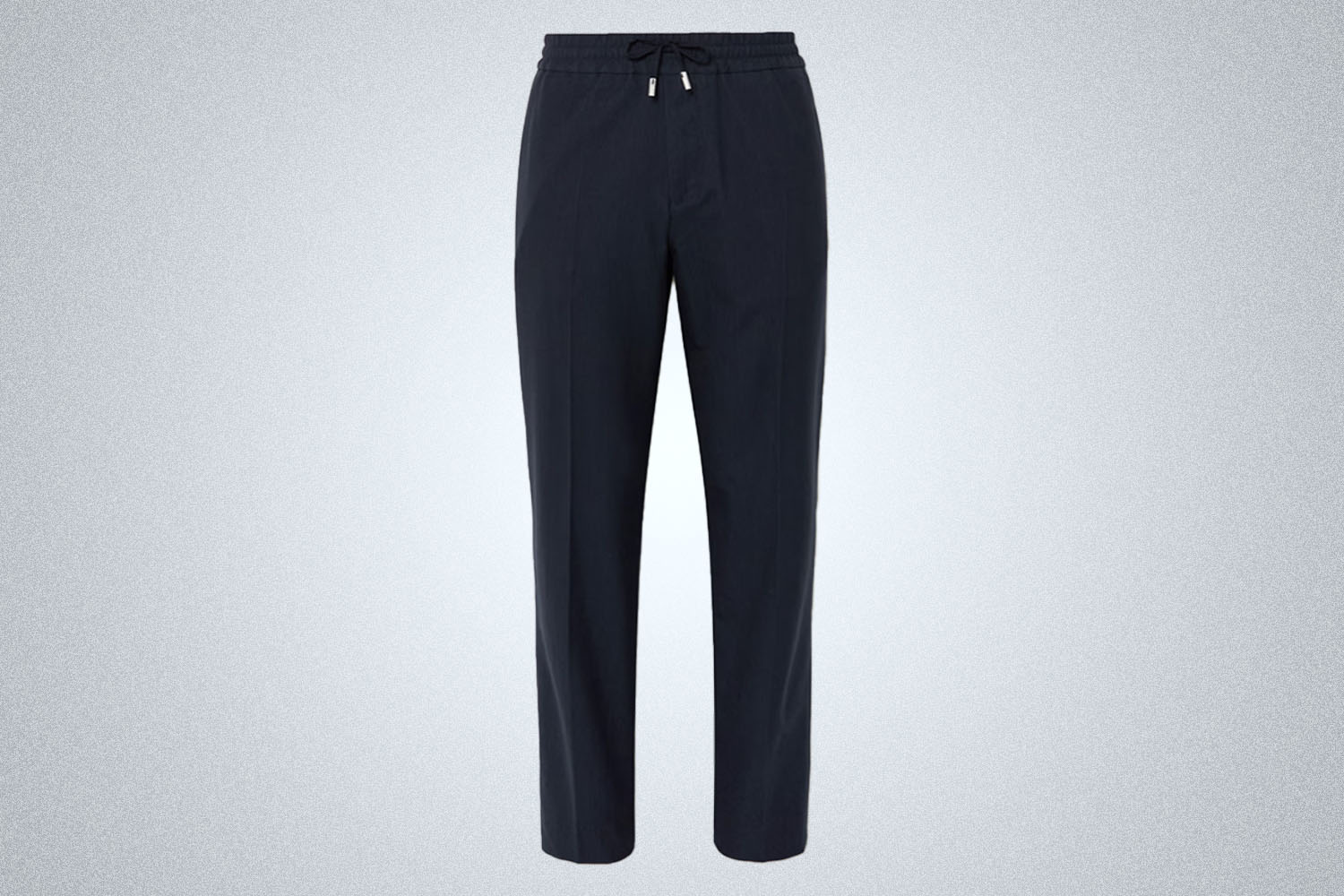 a pair of drawstring navy pants on a grey background