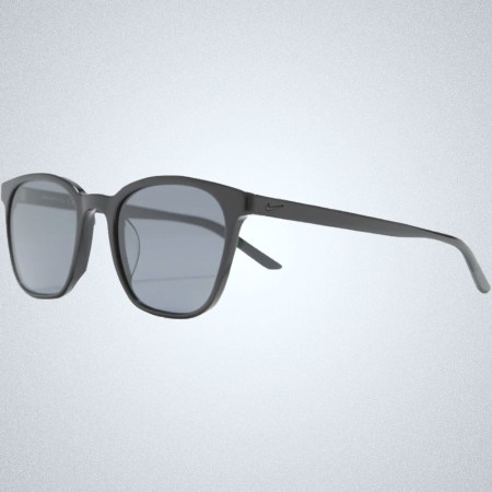 a pair of black square sunglasses with blue lenses from Nike on a grey background