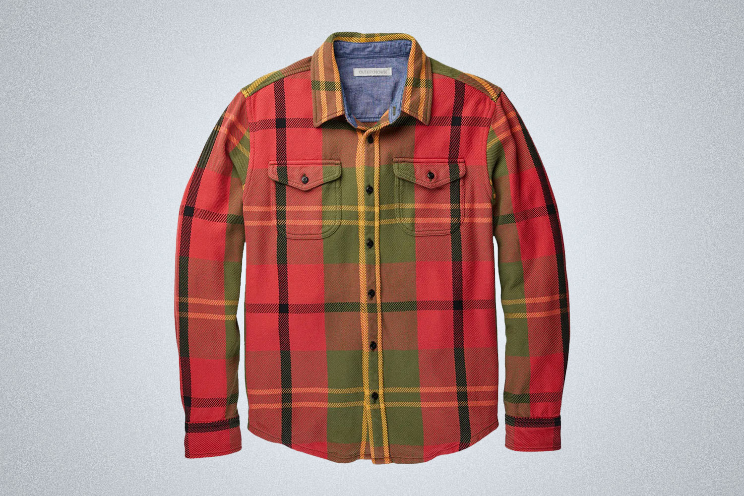 a red blanket shirt button-up from Outerknown on a grey background