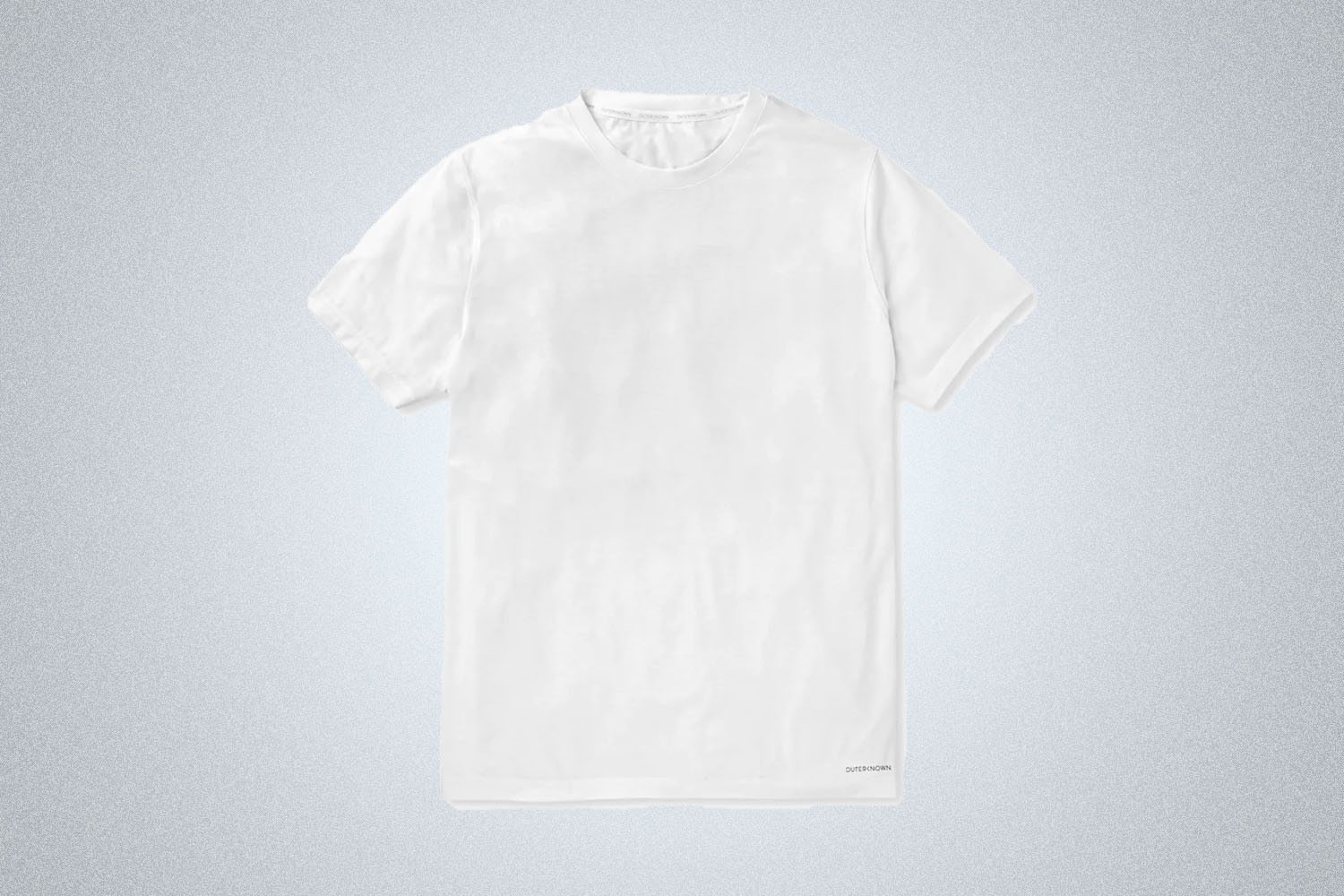 a white tee from Outerknown on a grey background