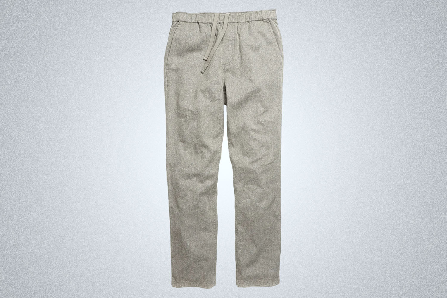 a pair of grey beach pants from Outerknown on a grey background