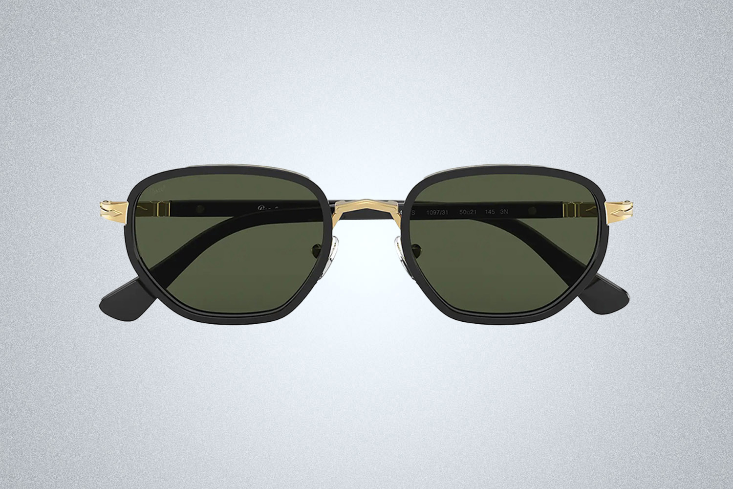 black round Persol sunglasses on a grey background