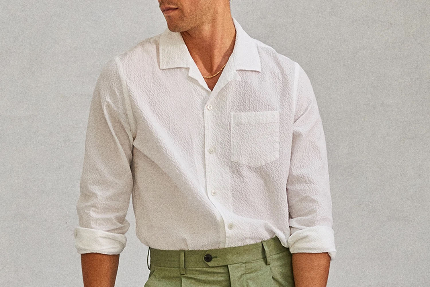 A model in a Todd Snyder Portuguese Seersucker shirt