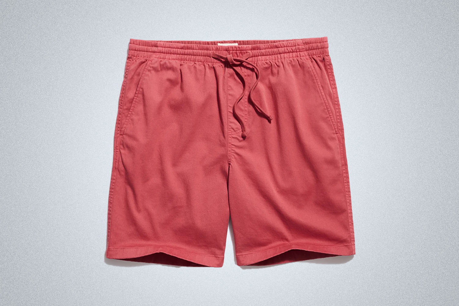 a pair of red shorts from Todd Snyder on a grey background