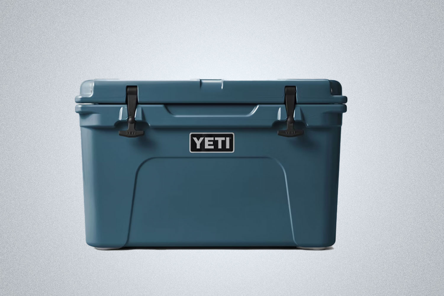 A blue Yeti cooler on a grey background