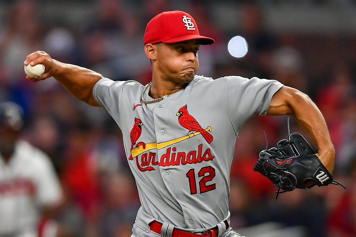 Relief pitcher Jordan Hicks throws a pitch for the Cardinals against the Braves.