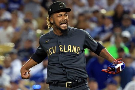 Emmanuel Clase celebrates after getting the final out against the National League