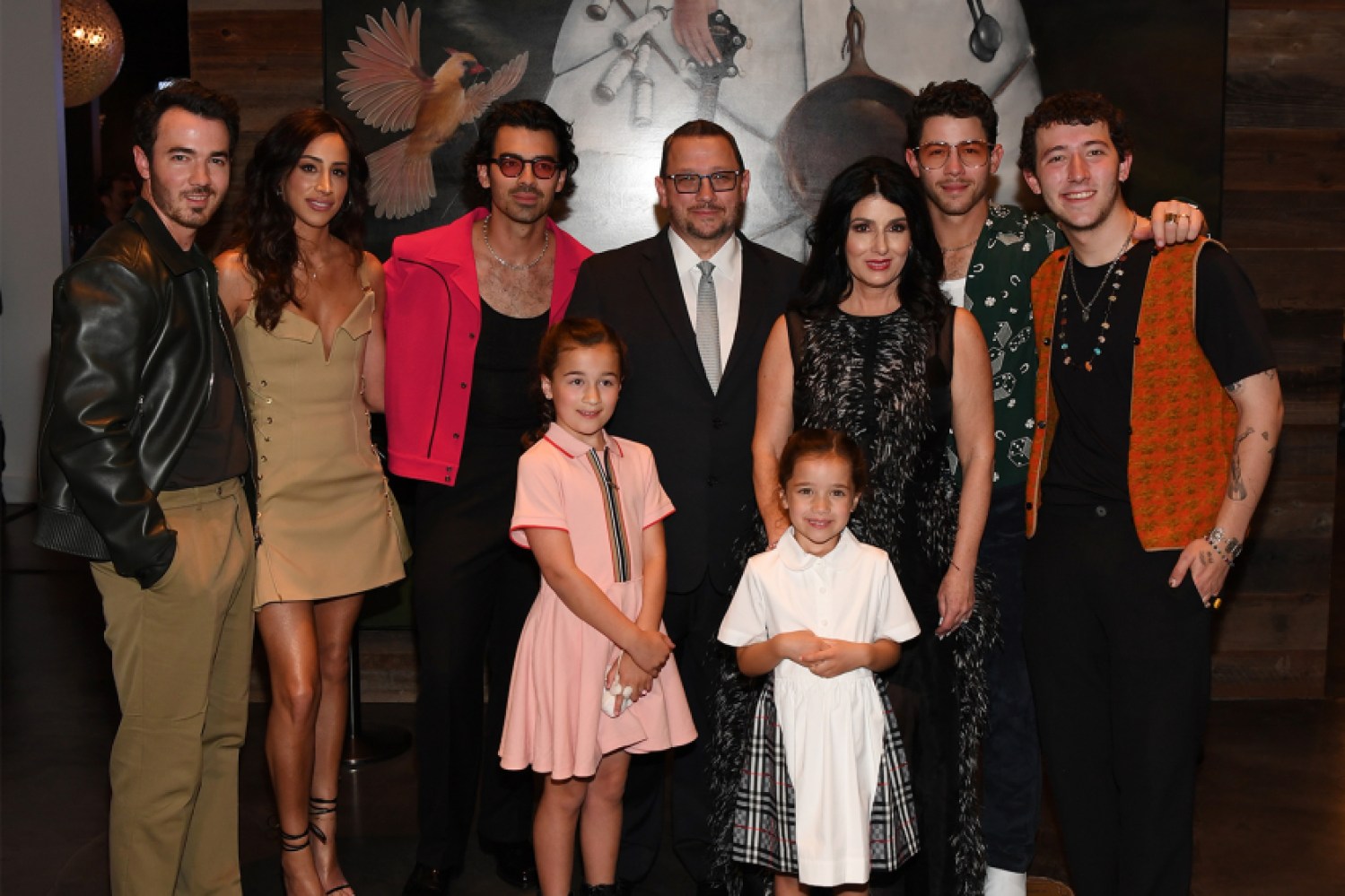 The Jonas Brothers and family in Las Vegas with Kevin Sr., the mastermind behind Nellie's Southern Kitchen, in the center.