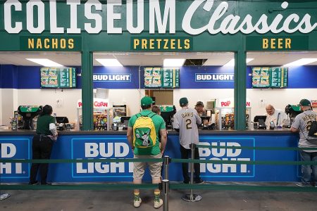 Fans purchasing food from concession stands on Opening Day at Oakland-Alameda County Coliseum