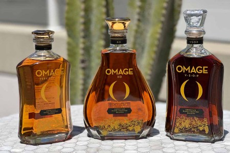The three bottles of Omage, a new California brandy