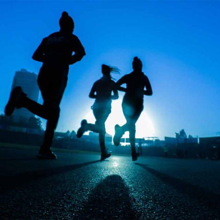 Three people running in the morning. A new study suggests people should exercise far more often than current recommendations.