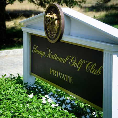 A sign is seen at an entrance to the Trump National Golf Club