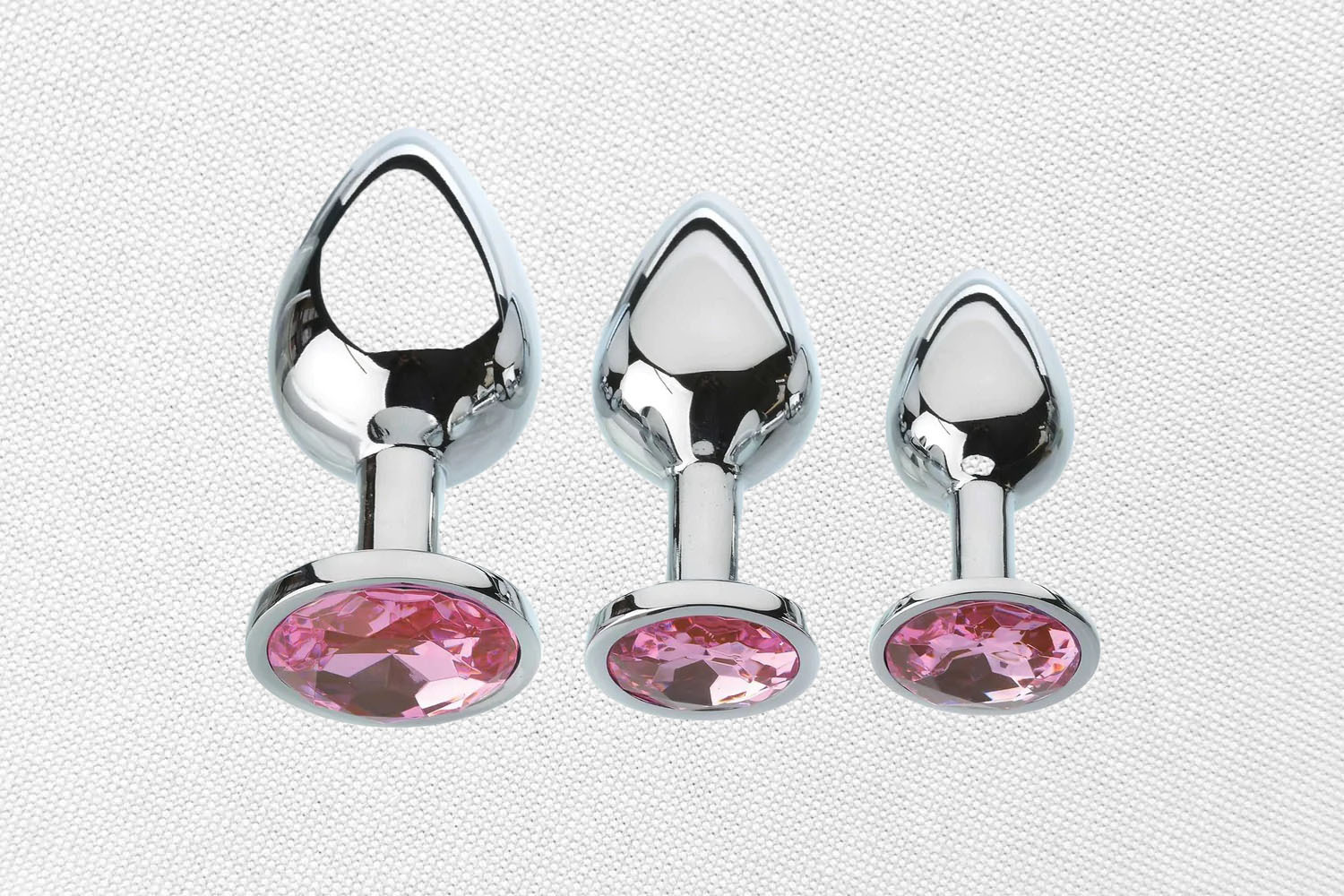 An Adam and Eve Pink Gemstone anal toy on a white background.