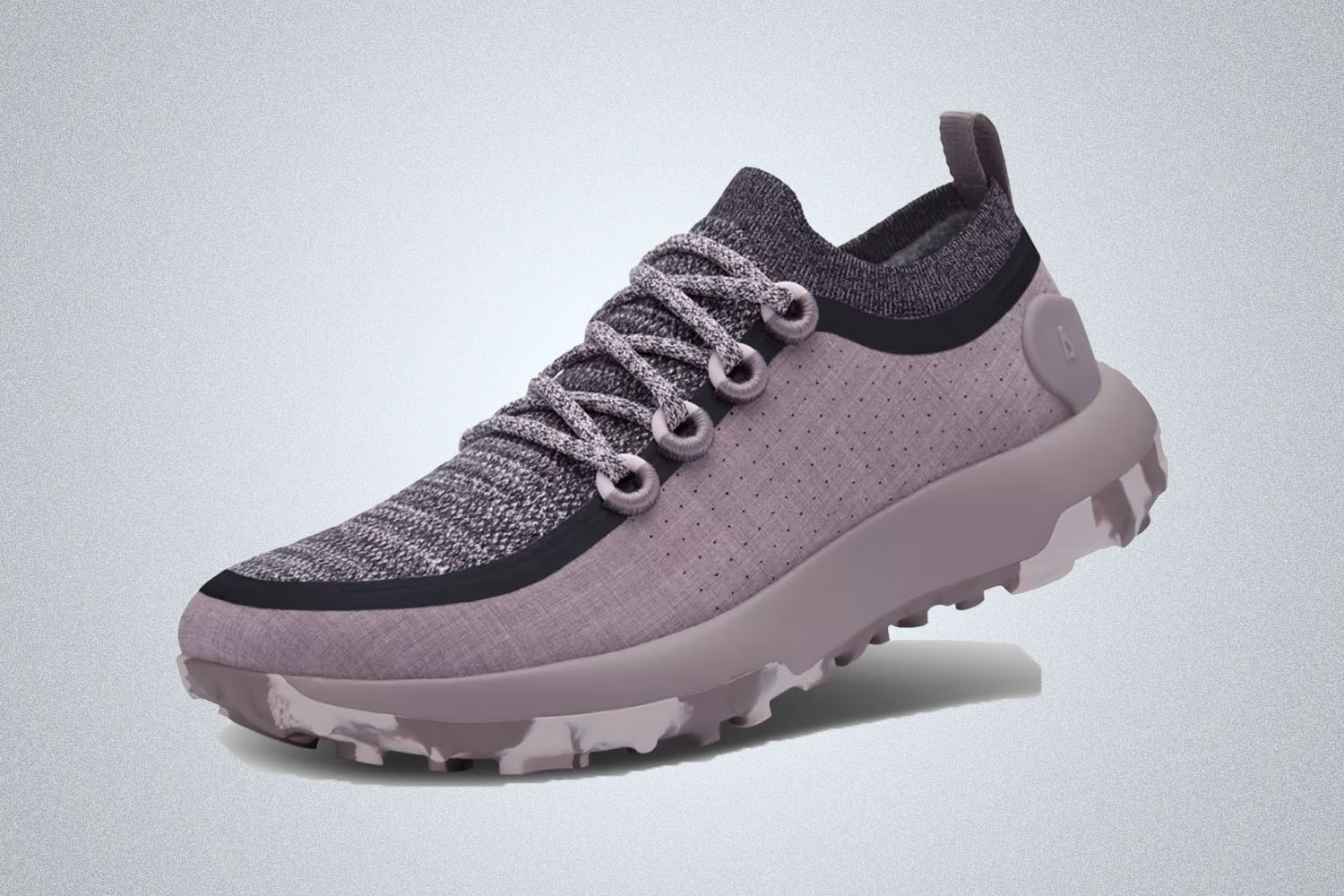 The purple and grey Trail Runner sneaker from Allbirds on a grey background