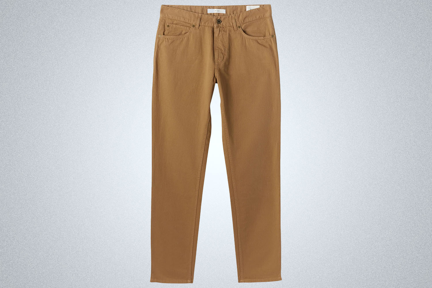 a pair of tan linen pants Billy Reid on a grey background